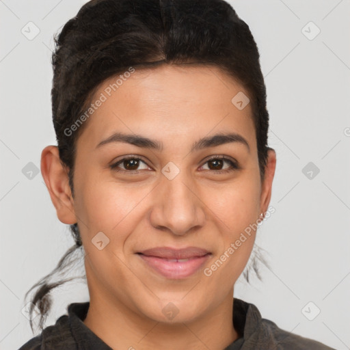 Joyful latino young-adult female with short  brown hair and brown eyes