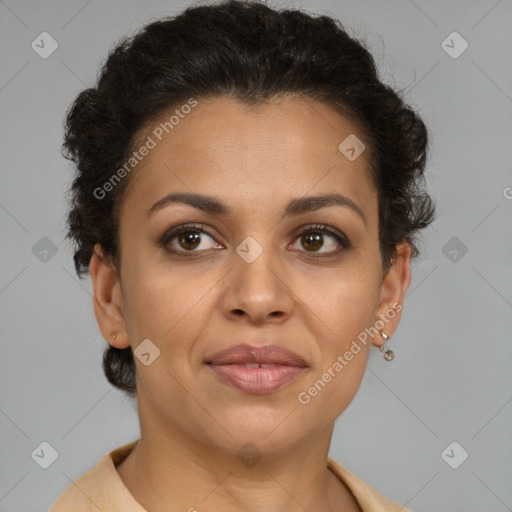 Joyful latino adult female with short  brown hair and brown eyes