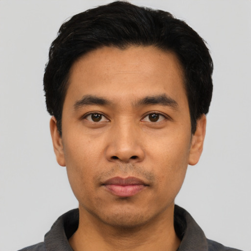 Neutral asian young-adult male with short  black hair and brown eyes