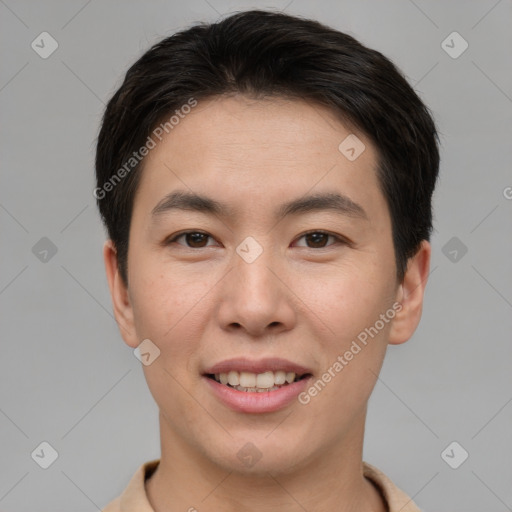 Joyful asian young-adult male with short  brown hair and brown eyes