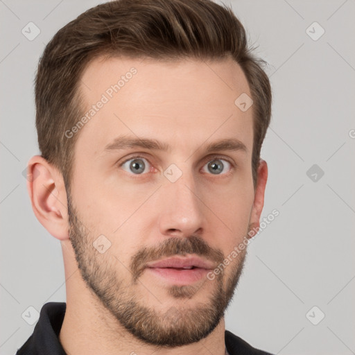 Neutral white young-adult male with short  brown hair and grey eyes