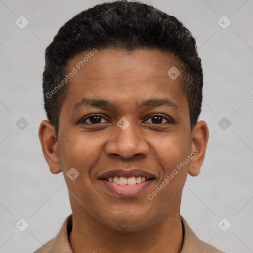 Joyful latino young-adult male with short  brown hair and brown eyes