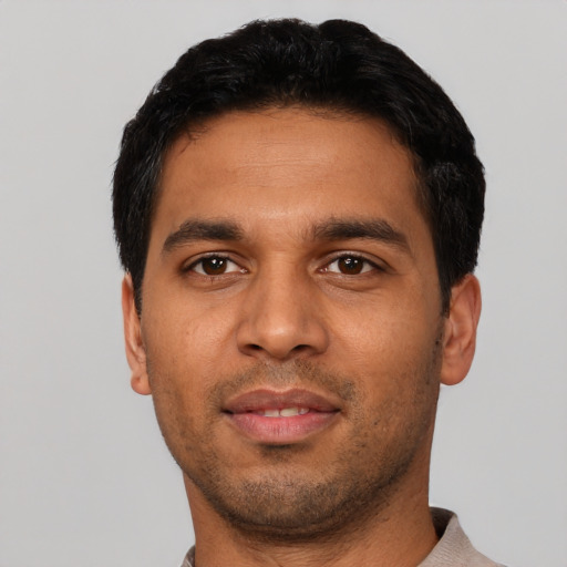 Neutral latino young-adult male with short  black hair and brown eyes