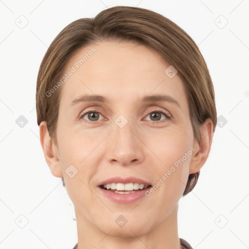 Joyful white young-adult female with short  brown hair and grey eyes