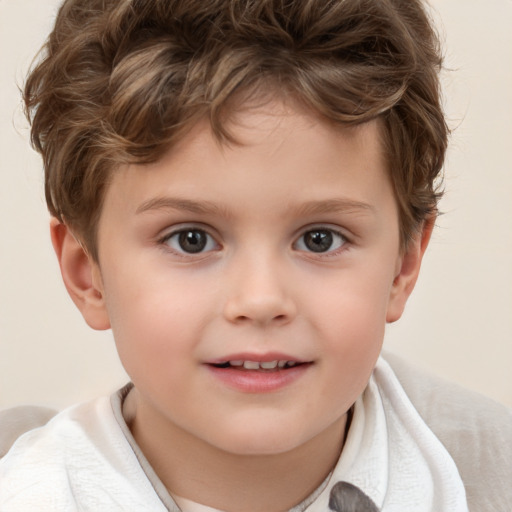 Joyful white child male with short  brown hair and brown eyes