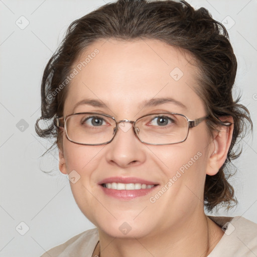 Joyful white adult female with medium  brown hair and blue eyes