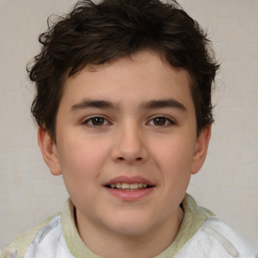 Joyful white child male with short  brown hair and brown eyes