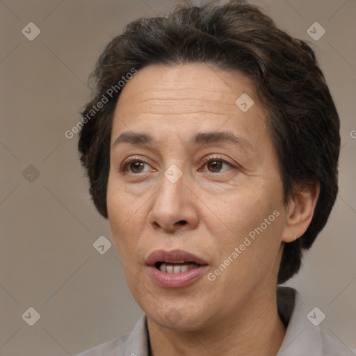 Joyful white adult female with short  brown hair and brown eyes