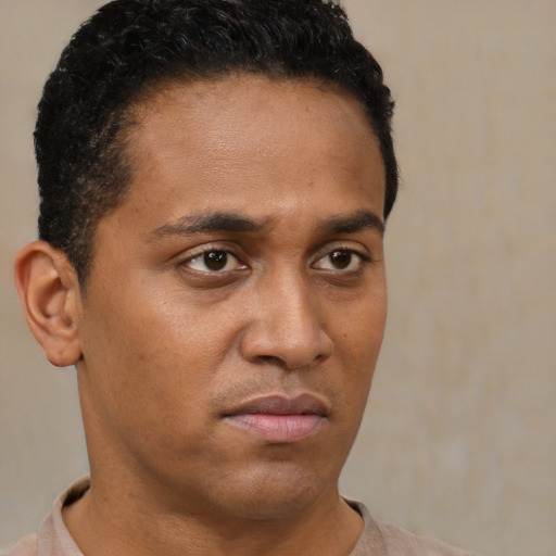 Neutral black young-adult male with short  brown hair and brown eyes