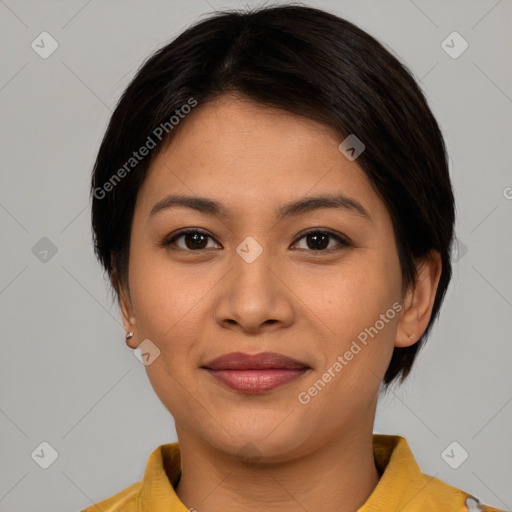 Joyful asian young-adult female with short  brown hair and brown eyes