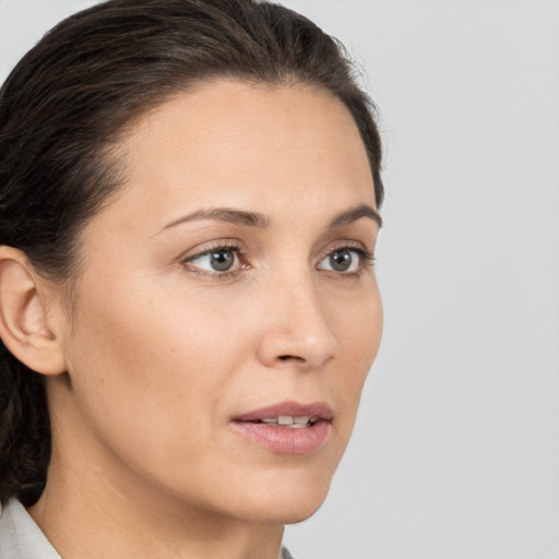 Neutral white young-adult female with medium  brown hair and brown eyes