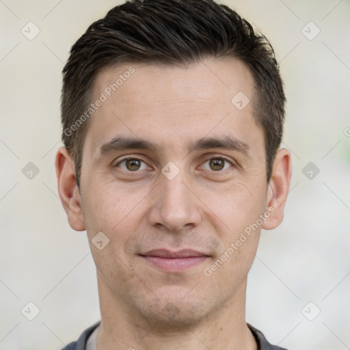 Joyful white adult male with short  brown hair and brown eyes