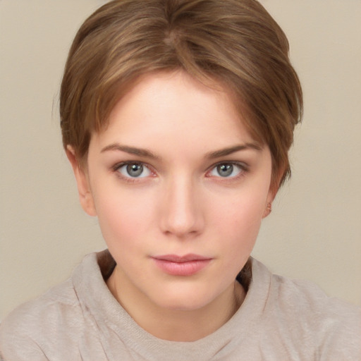 Neutral white young-adult female with short  brown hair and grey eyes