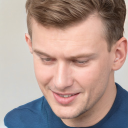 Joyful white adult male with short  brown hair and grey eyes