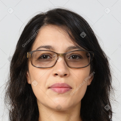 Joyful white adult female with long  brown hair and brown eyes