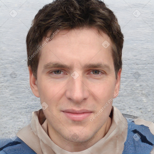 Joyful white young-adult male with short  brown hair and blue eyes