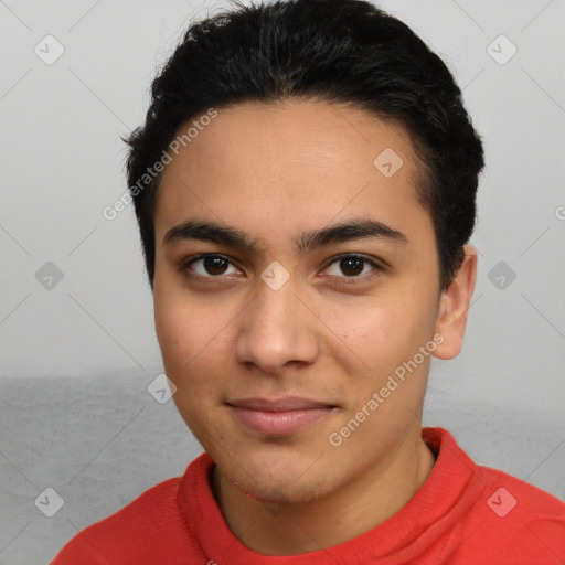 Joyful white young-adult male with short  black hair and brown eyes