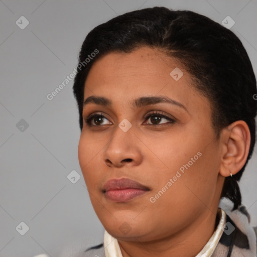 Joyful asian young-adult female with short  black hair and brown eyes