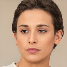 Neutral white young-adult female with short  brown hair and brown eyes