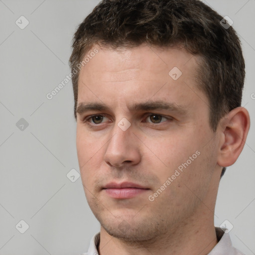 Neutral white young-adult male with short  brown hair and brown eyes