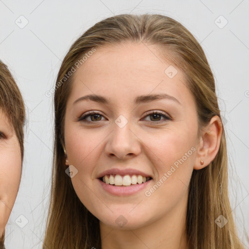 Joyful white young-adult female with long  brown hair and brown eyes