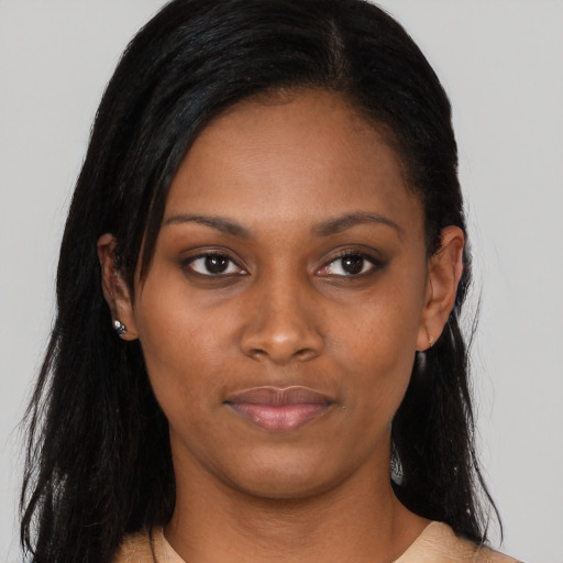 Neutral black young-adult female with long  black hair and brown eyes