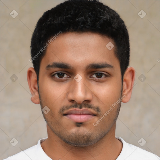 Neutral latino young-adult male with short  black hair and brown eyes