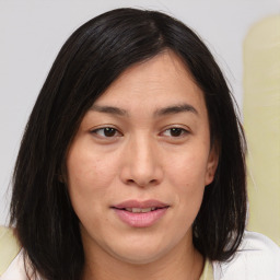 Joyful white young-adult female with medium  brown hair and brown eyes