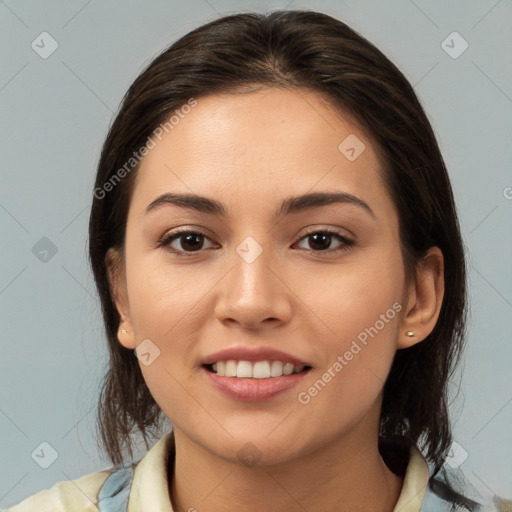 Joyful white young-adult female with medium  brown hair and brown eyes