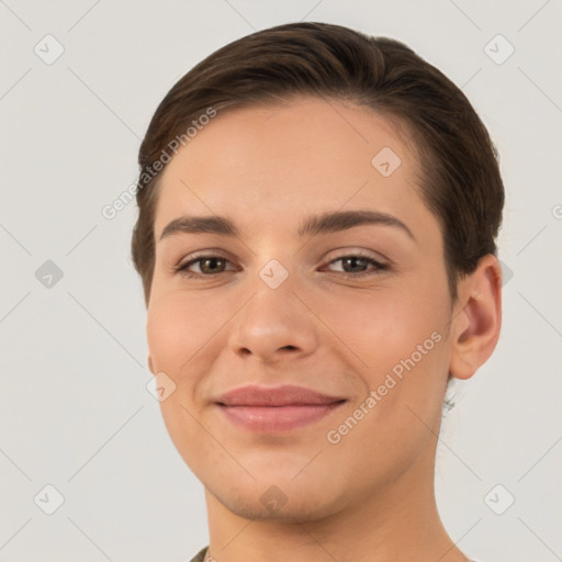 Joyful white young-adult female with short  brown hair and brown eyes