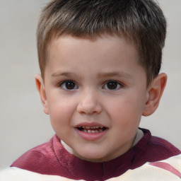 Joyful white child male with short  brown hair and brown eyes