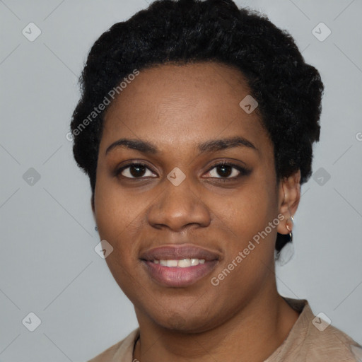 Joyful black young-adult female with short  black hair and brown eyes