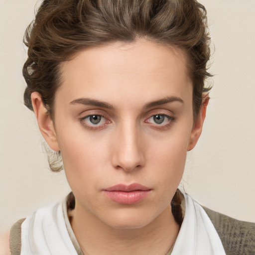 Neutral white young-adult female with short  brown hair and brown eyes