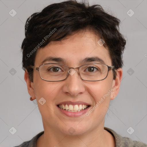 Joyful white adult female with short  brown hair and brown eyes