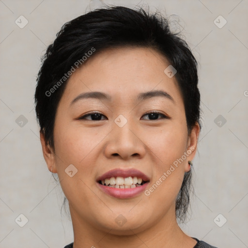 Joyful asian young-adult female with medium  black hair and brown eyes