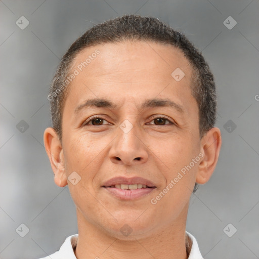 Joyful white adult male with short  brown hair and brown eyes