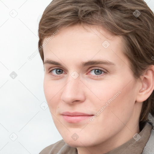 Neutral white young-adult female with short  brown hair and grey eyes