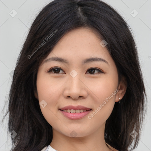 Joyful asian young-adult female with long  brown hair and brown eyes