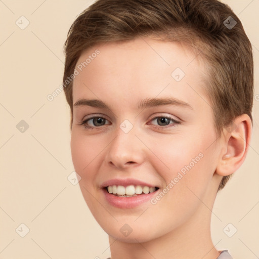 Joyful white young-adult female with short  brown hair and brown eyes