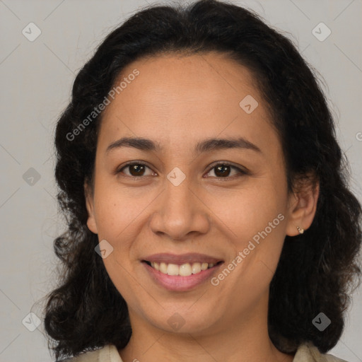 Joyful latino young-adult female with medium  brown hair and brown eyes