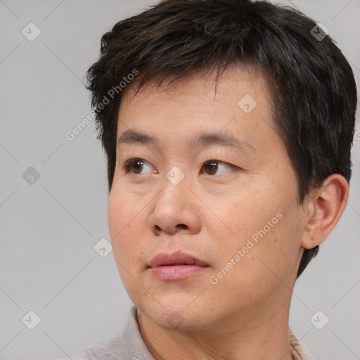 Neutral asian young-adult male with short  brown hair and brown eyes