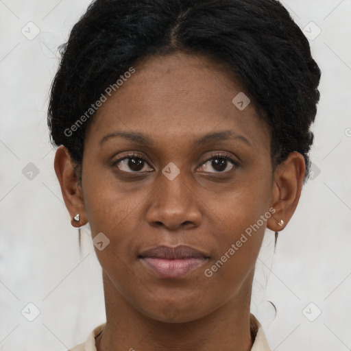 Joyful black young-adult female with short  brown hair and brown eyes