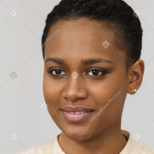 Joyful black young-adult female with short  brown hair and brown eyes