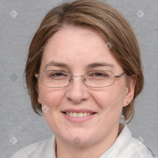 Joyful white adult female with medium  brown hair and blue eyes