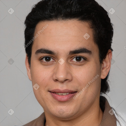 Joyful latino young-adult male with short  brown hair and brown eyes