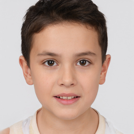 Joyful white child male with short  brown hair and brown eyes