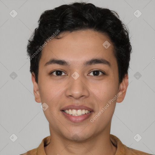 Joyful latino young-adult male with short  brown hair and brown eyes