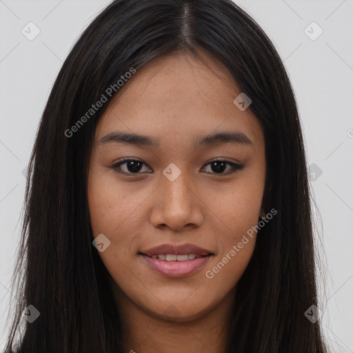 Joyful asian young-adult female with long  brown hair and brown eyes