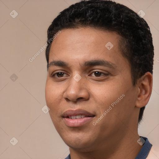 Joyful white young-adult male with short  black hair and brown eyes