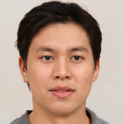 Neutral asian young-adult male with short  brown hair and brown eyes